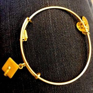 Alex and ani bracelet with graduation cap charm.